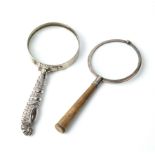An early 20th century silver magnifying glass, with a shagreen handle by Asprey London, 7.5cm