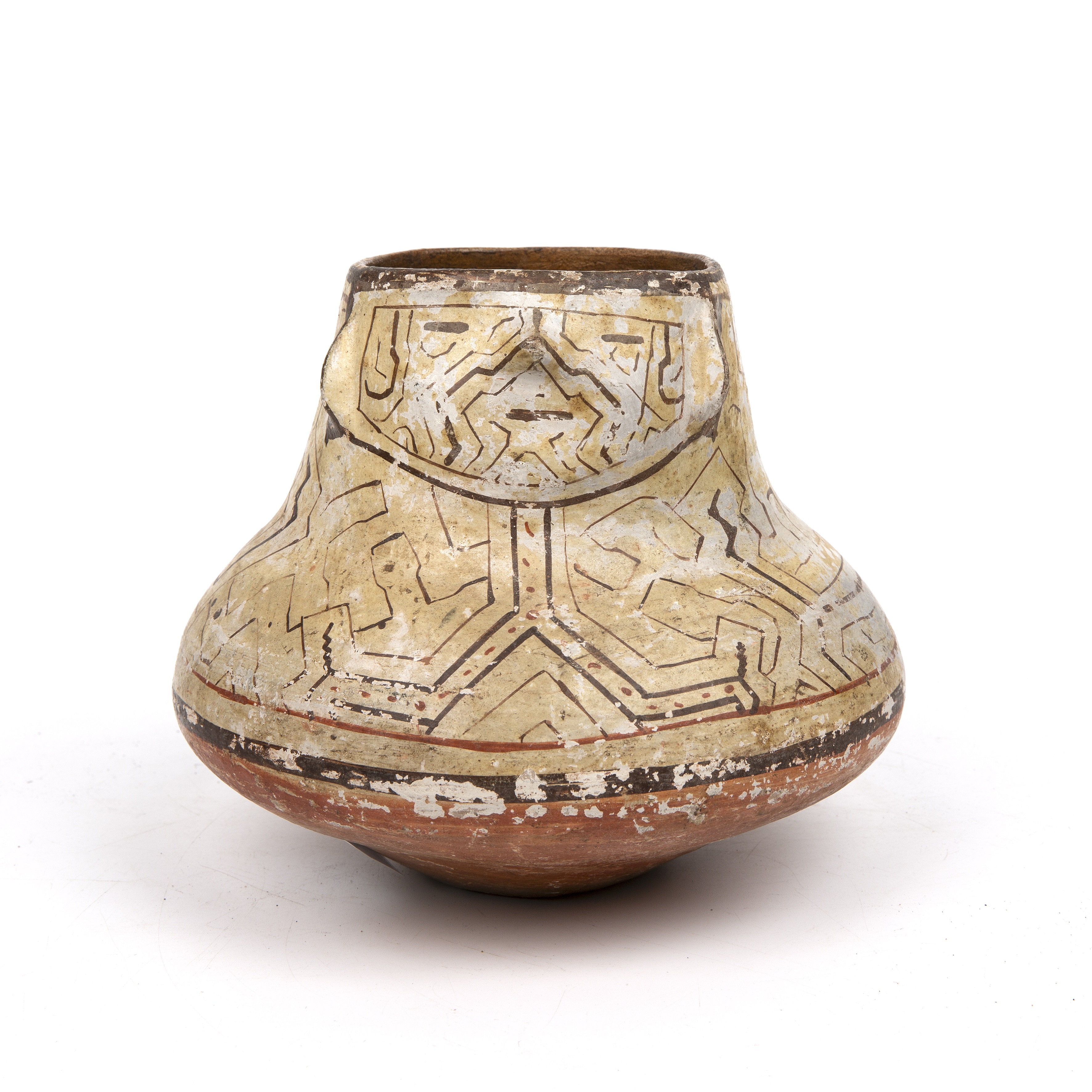 A 20th century Peruvian Shipibo vase 17cm wide 14cm high