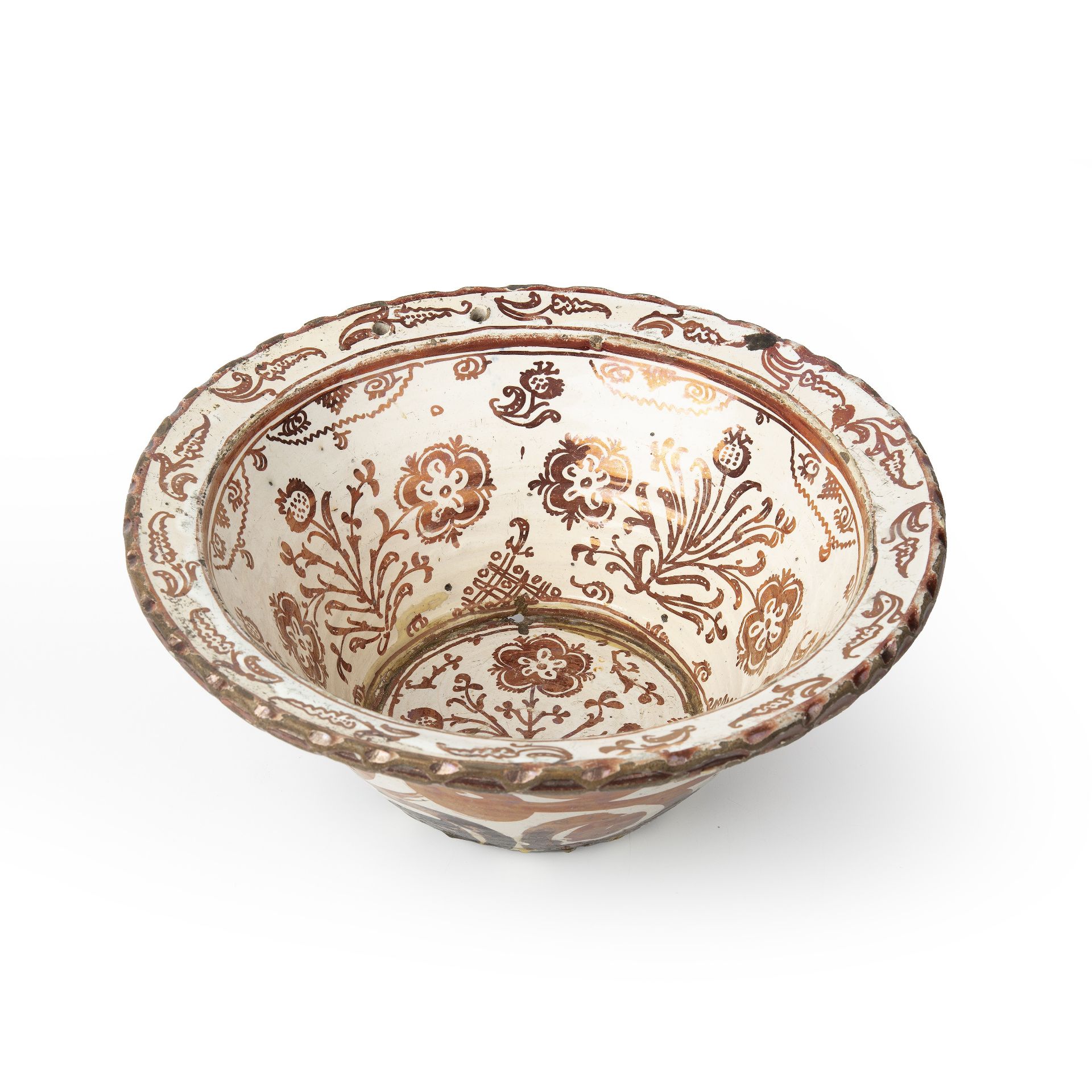 A 17th/18th century Hispano-Moresque copper lustre bowl with foliate decoration, 30cm diameter 12.