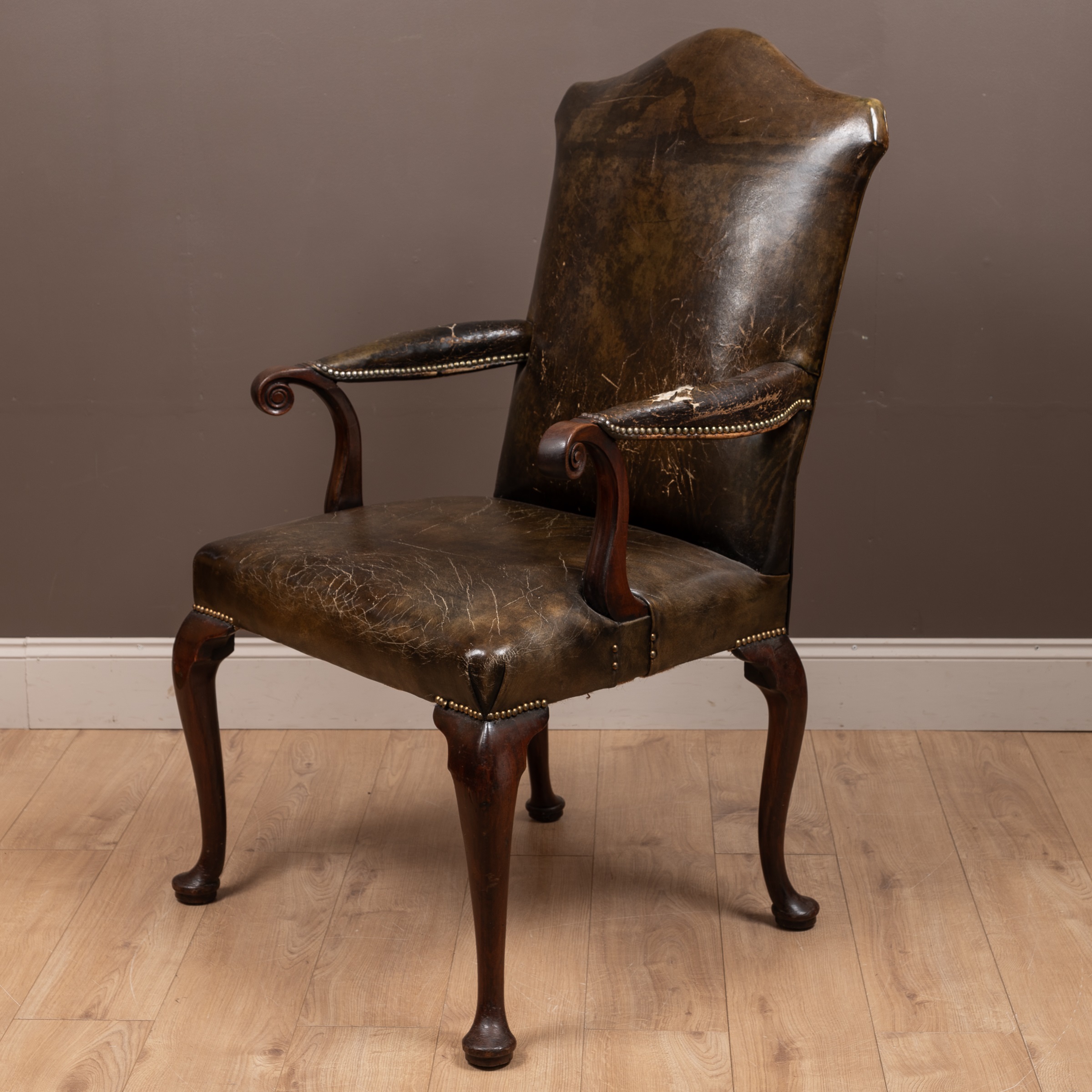 A George III mahogany framed leather upholstered library chair with a shaped back, scrolling arm - Image 2 of 9