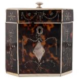 A George III octagonal tortoiseshell tea caddy with silver inlaid decoration and ivory borders. 10.
