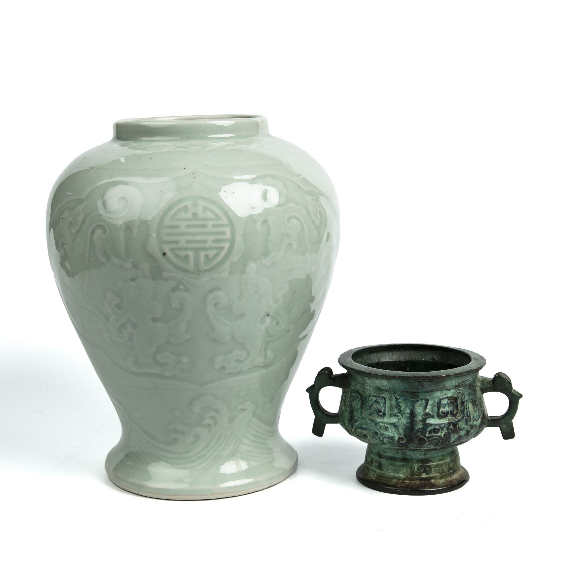 A Chinese porcelain celadon vase 22cm wide 26cm high together with a eastern bronze censer of