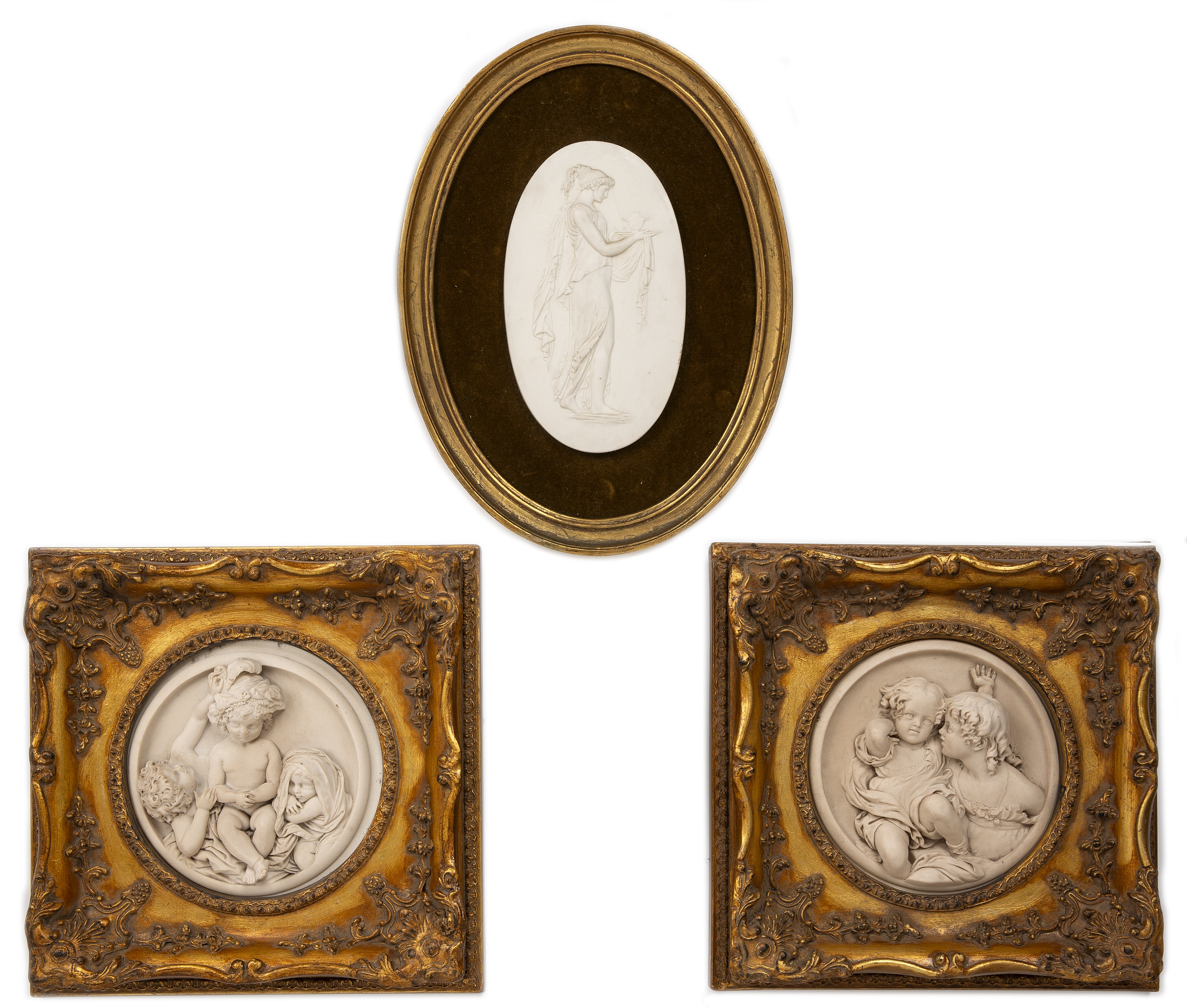 A Sevres porcelain oval classical plaque, 21cm x 12.5cm; together with a pair of composite reliefs