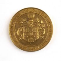 An 18 carat gold medallion Stonyhurst college Lancashire, In Oratione Anglica Bene Merenti, by