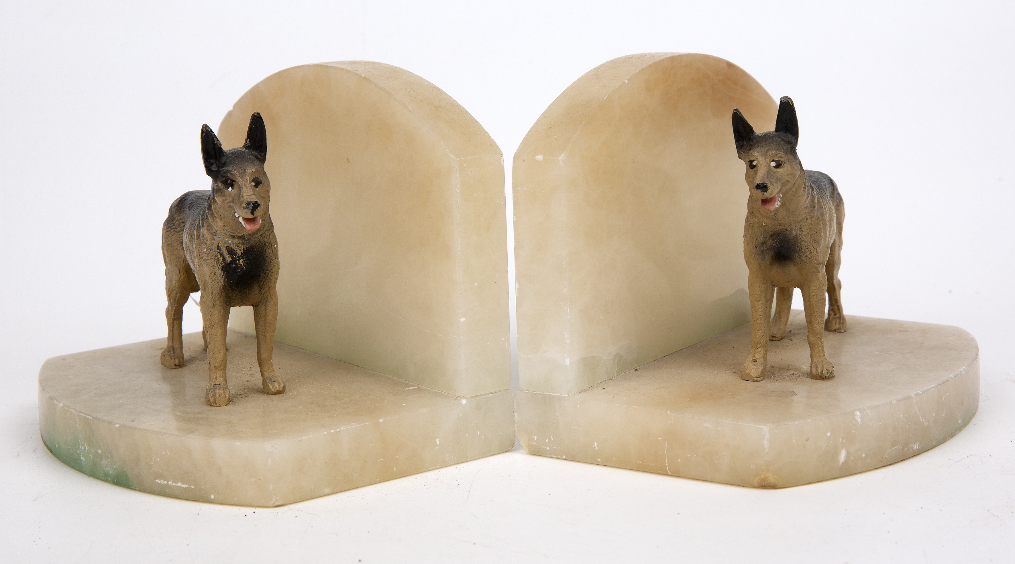 A pair of alabaster and spelter book ends in the form of German shepherd dogs each 15cm wide - Image 3 of 4