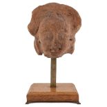 An ancient Indian terracotta pottery head 16cm wide 17cm high Provenance A private estate since