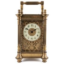 An early 20th century French gilt brass carriage timepiece 9cm wide 13cm high