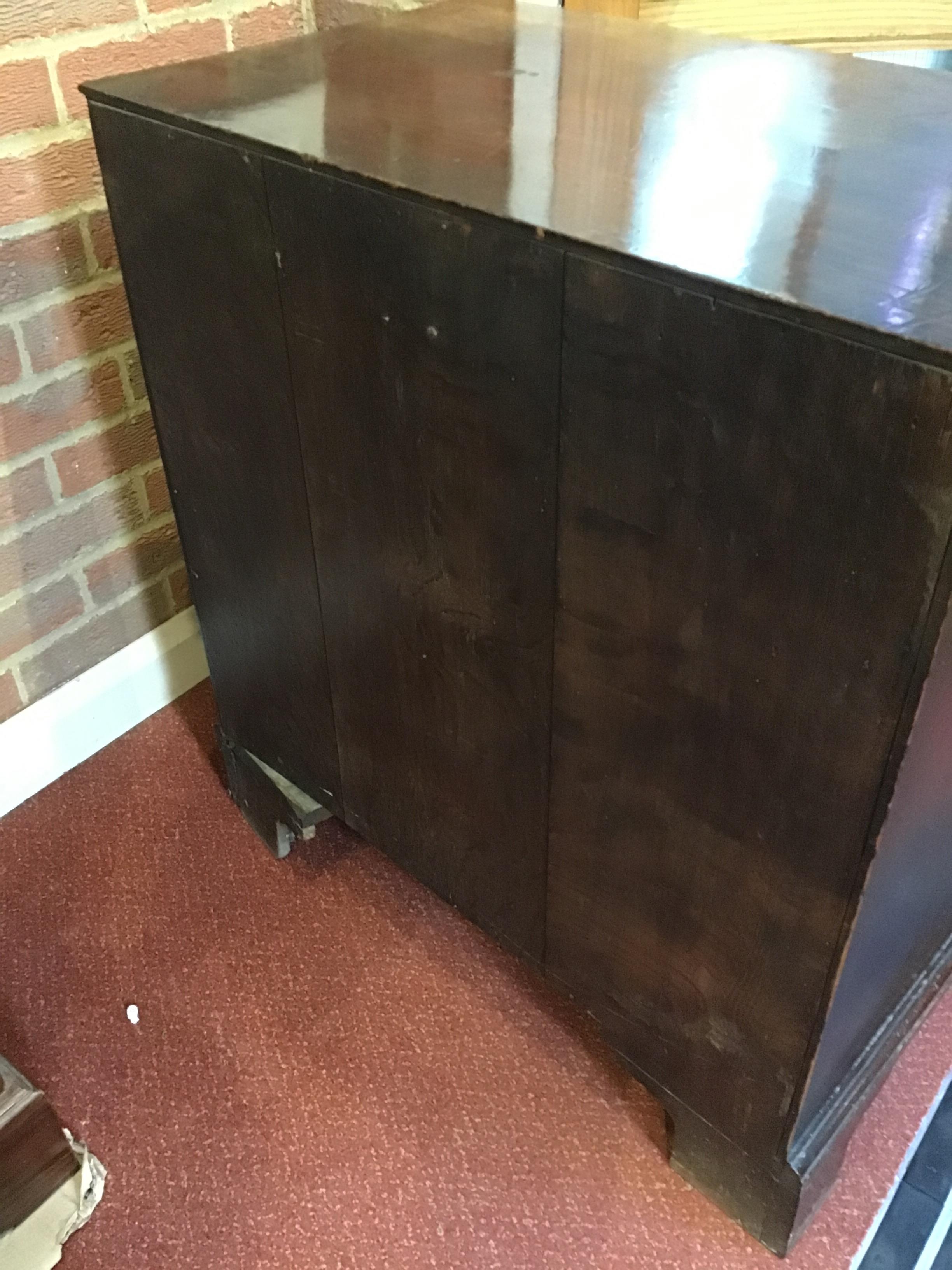 A George III mahogany chest of four long drawers having brass swan neck handles, a brushing slide - Image 30 of 31