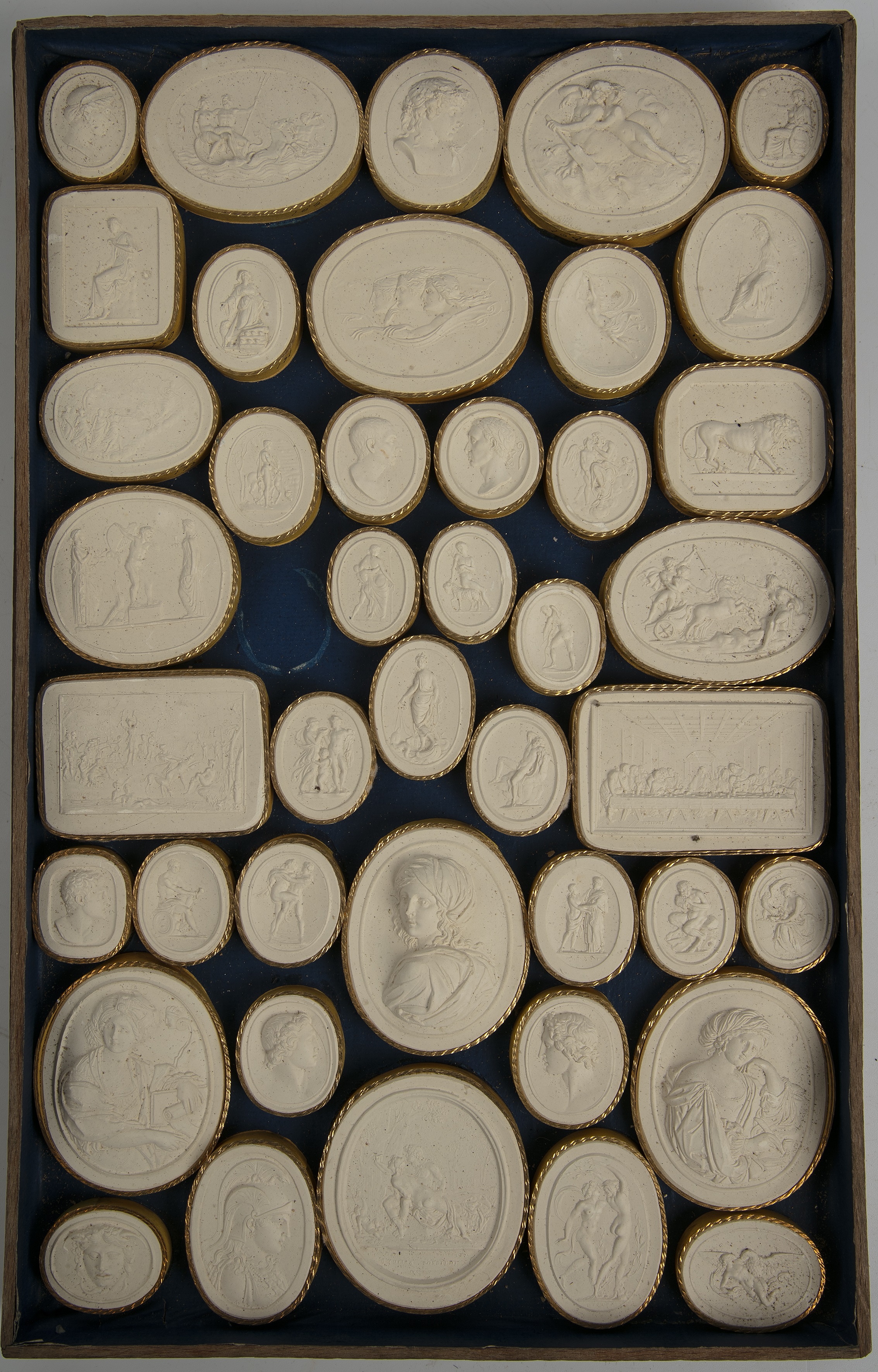 A large collection of Grand Tour plaster relief plaques approximately 400 in wooden trays. - Image 2 of 13