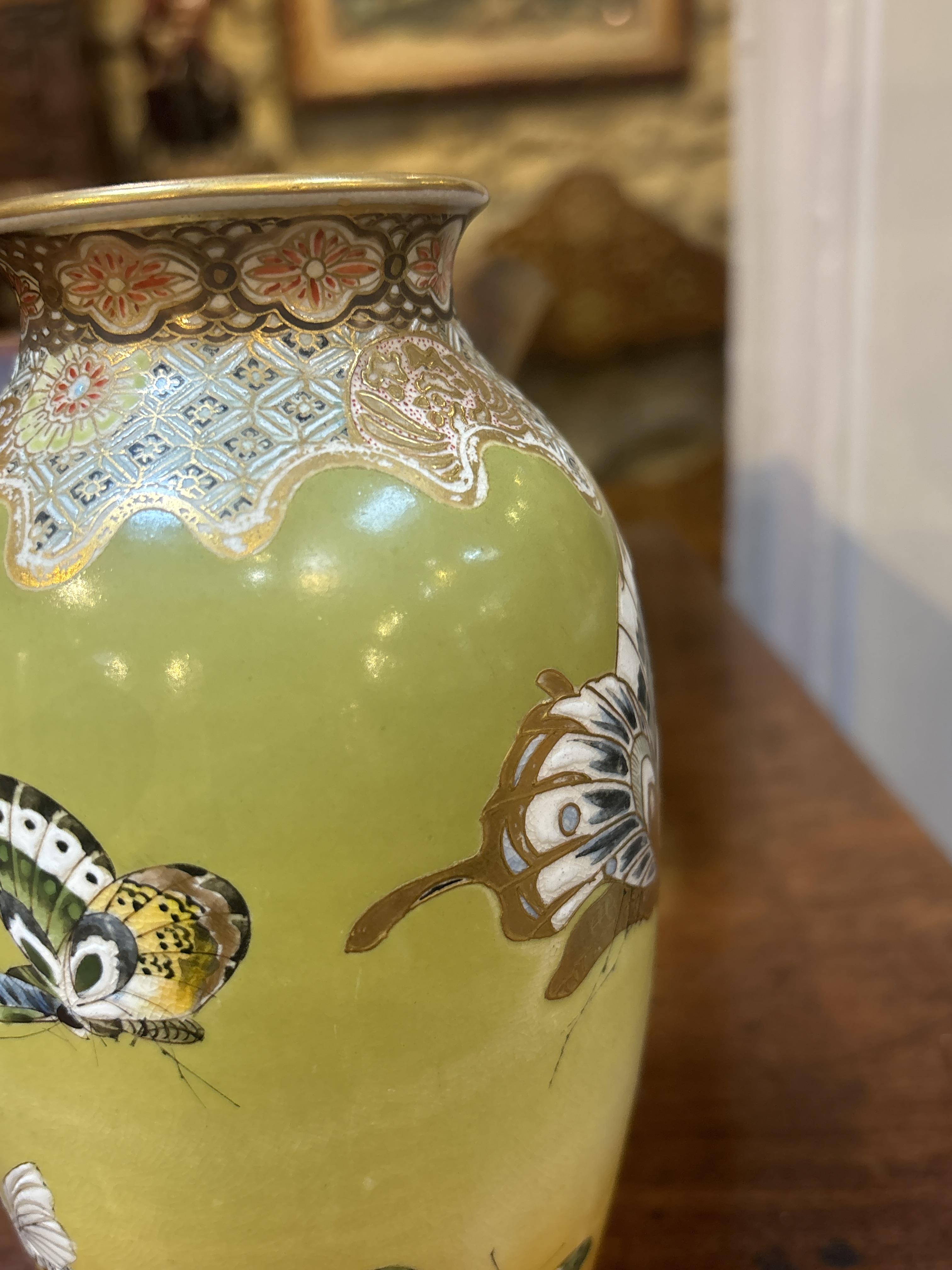 A pair of Japanese Meiji Satsuma porcelain vases decorated with butterflies and moths, with - Image 5 of 11