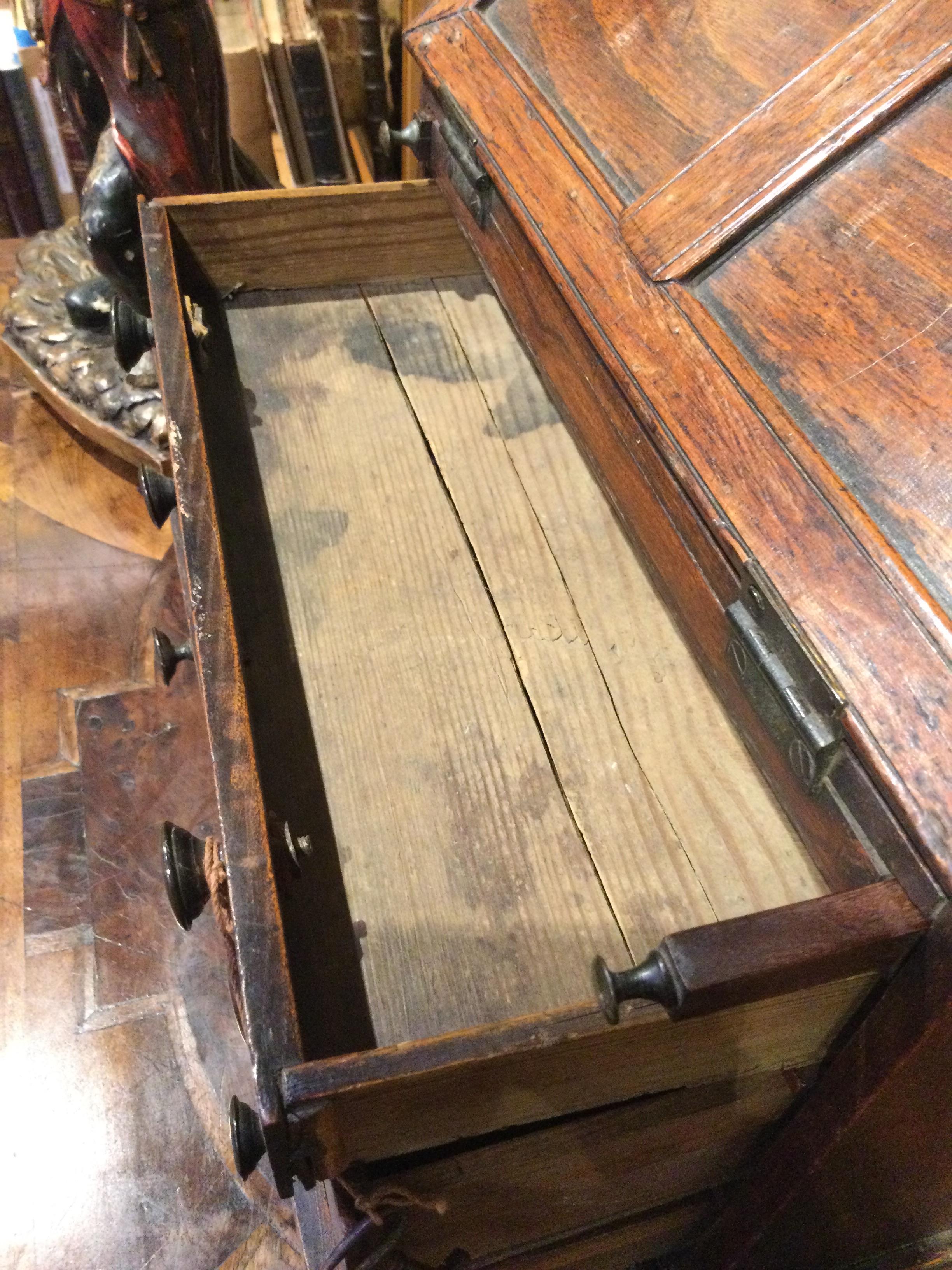 An 18th century elm apprentice bureau bookcase with panelled doors above a fall front three - Image 18 of 26