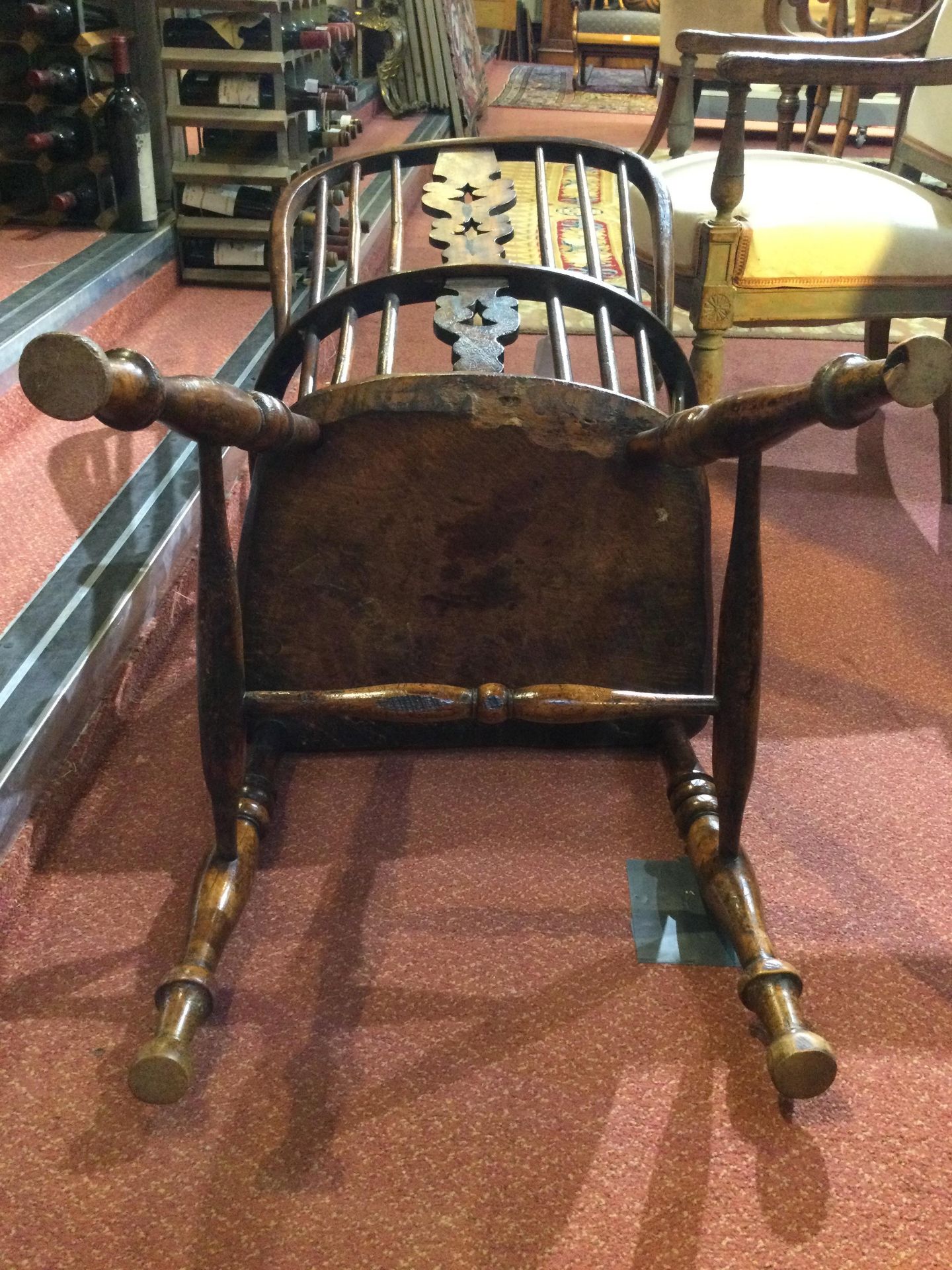 A 19th century ash and elm spindle back Windsor armchair with a pierced splat and turned supports, - Bild 11 aus 15