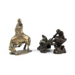 Two 19th century eastern gilt metal figures the largest 7cm x 6cm. (2)