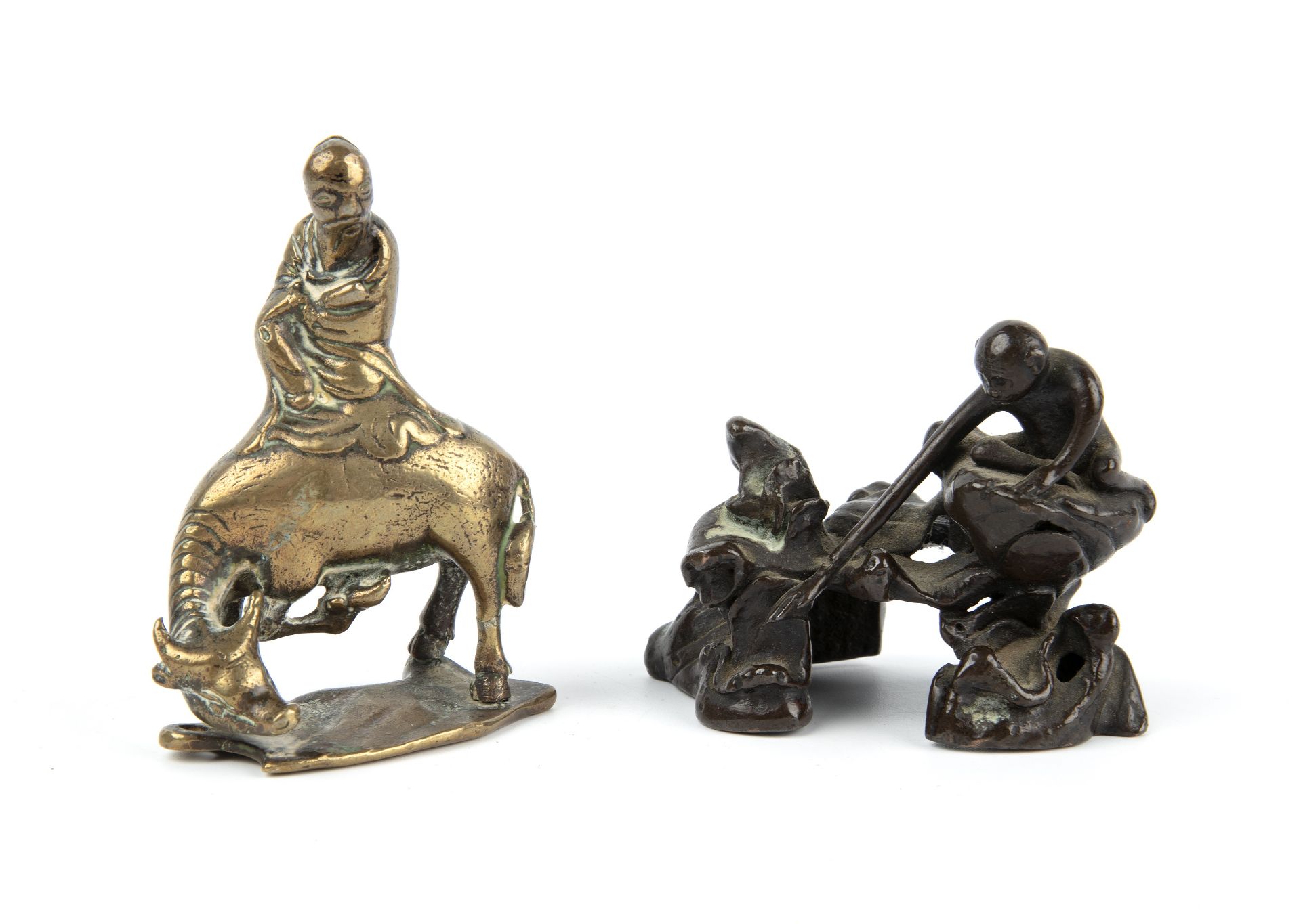Two 19th century eastern gilt metal figures the largest 7cm x 6cm. (2)