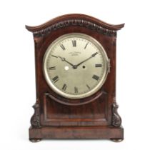 An early 19th century bracket clock by George Sharp having a silvered dial with Roman numerals and a