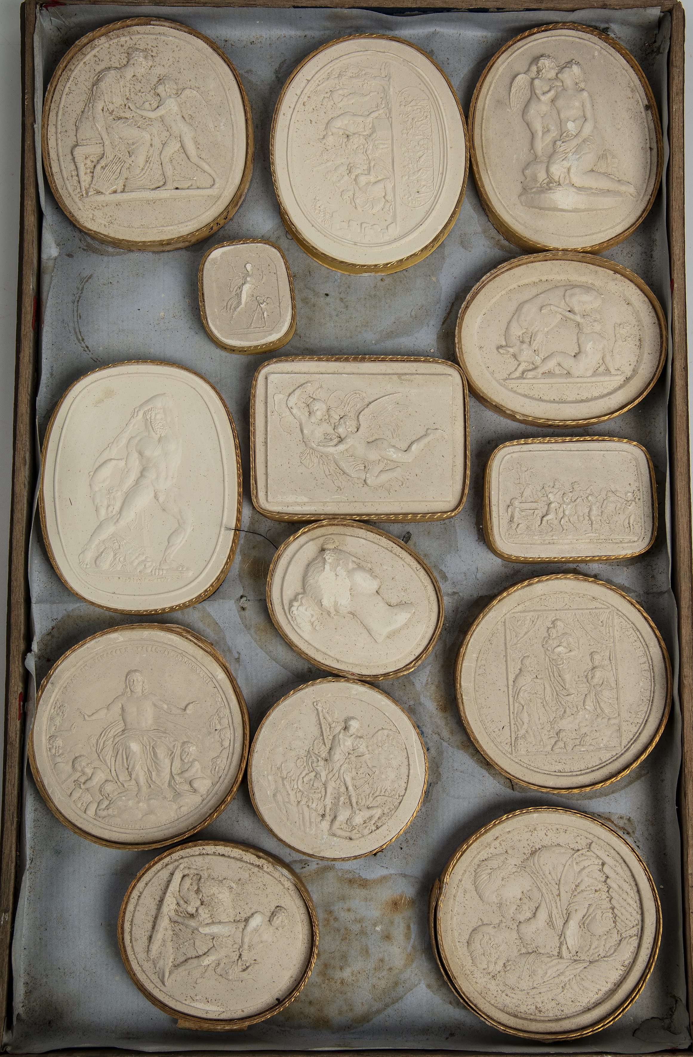 A large collection of Grand Tour plaster relief plaques approximately 400 in wooden trays. - Image 10 of 13