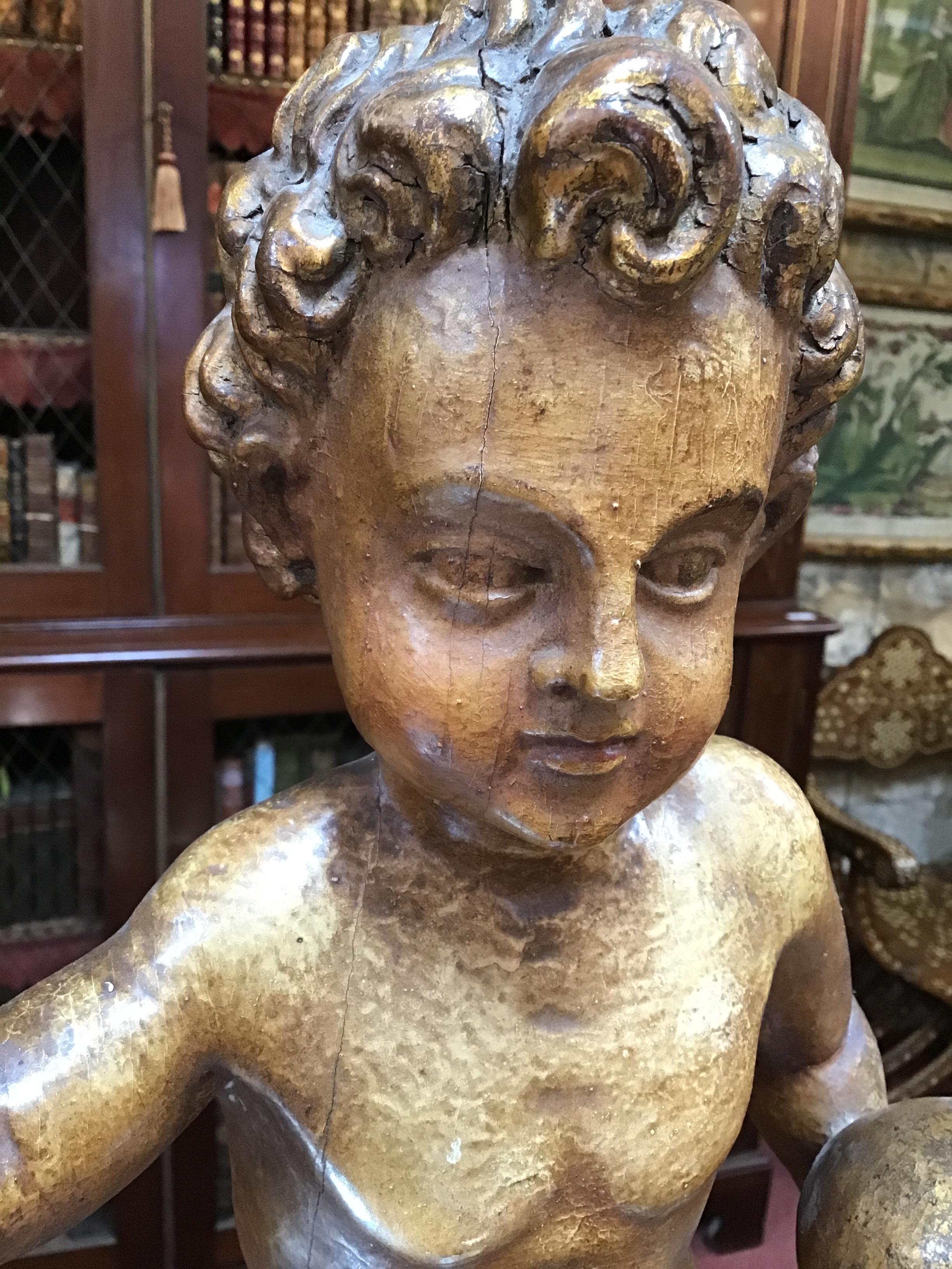 A 17th/18th century Italian gilded and carved limewood cherub on a rectangular gilded base 24cm wide - Image 6 of 26