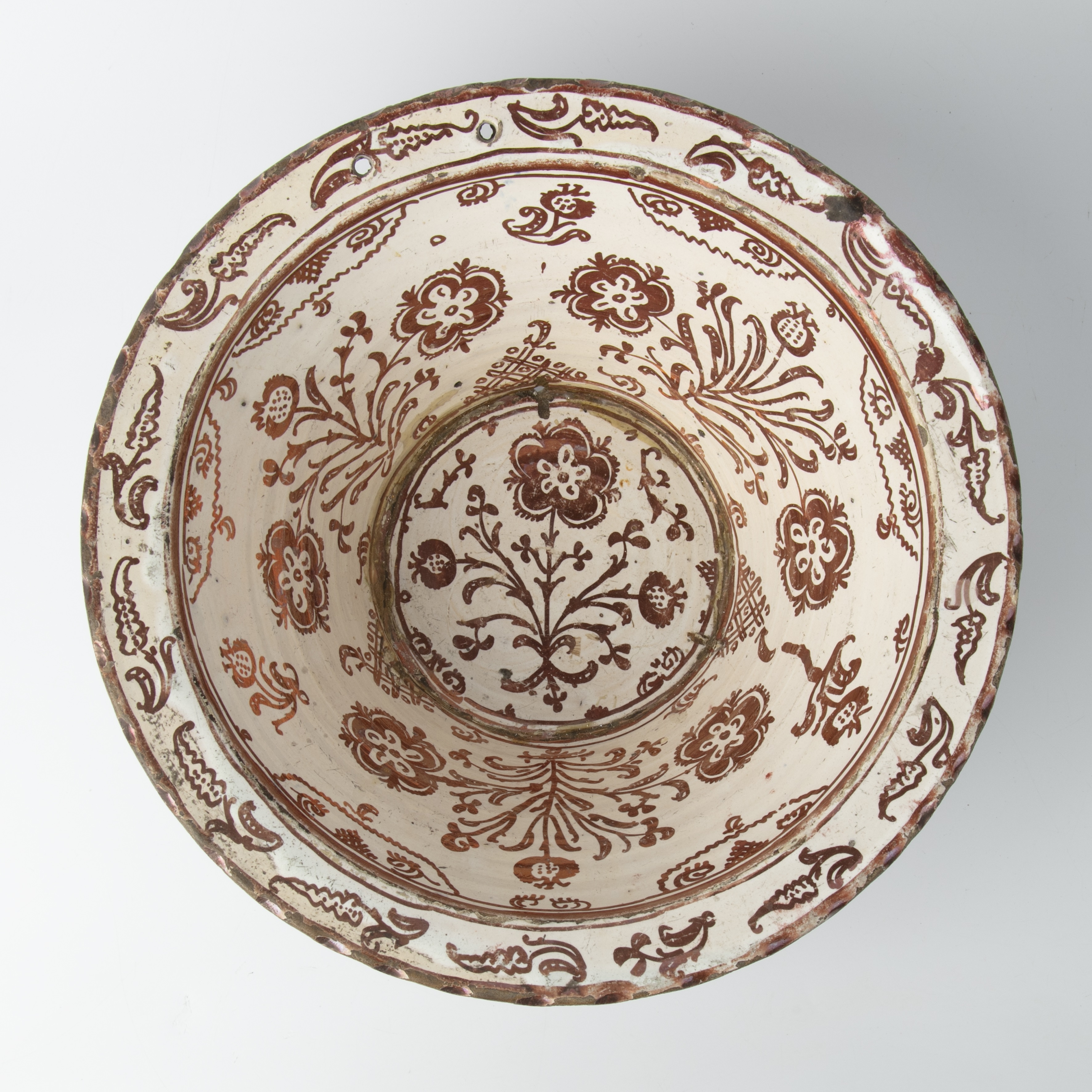 A 17th/18th century Hispano-Moresque copper lustre bowl with foliate decoration, 30cm diameter 12. - Image 2 of 4