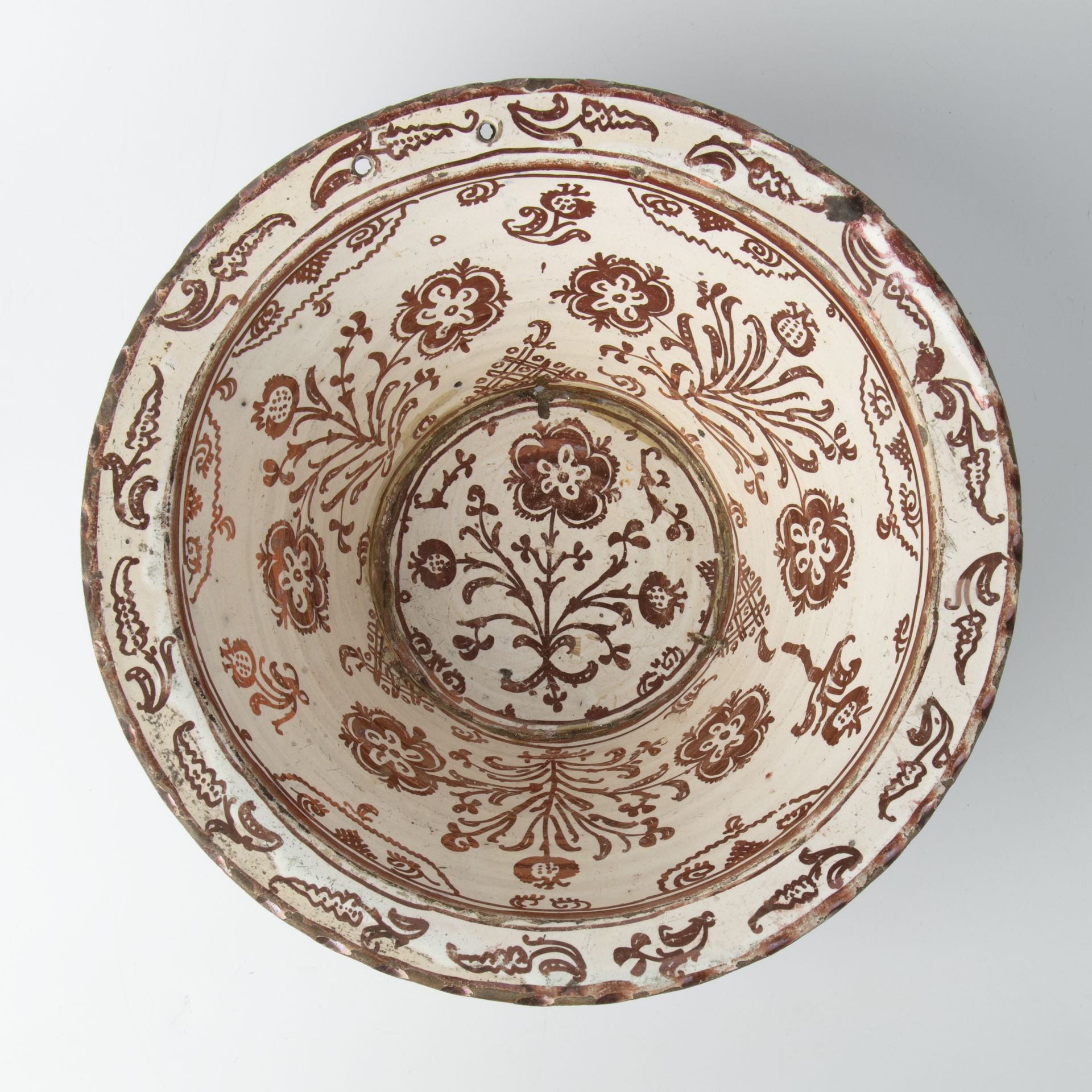 A 17th/18th century Hispano-Moresque copper lustre bowl with foliate decoration, 30cm diameter 12. - Image 2 of 4