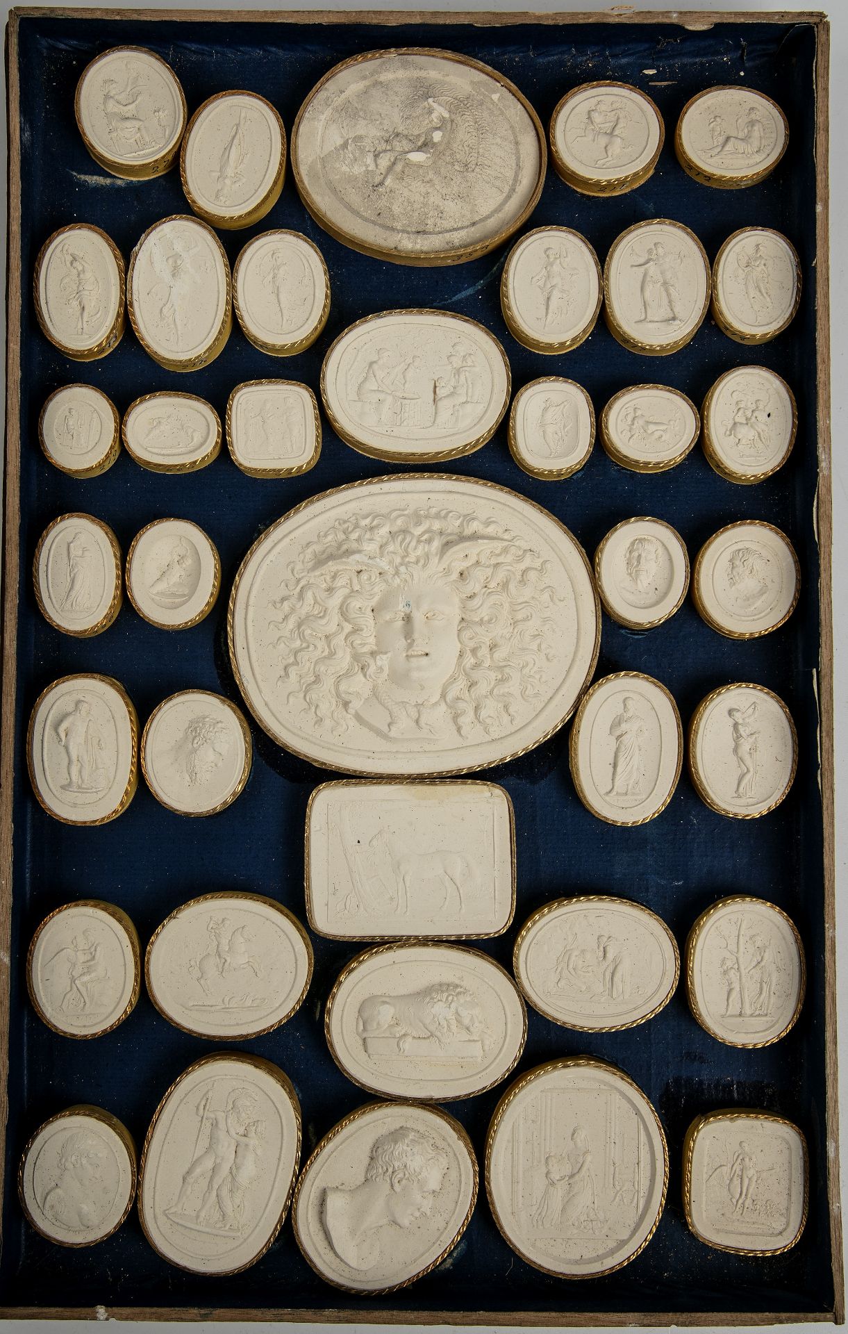 A large collection of Grand Tour plaster relief plaques approximately 400 in wooden trays. - Image 8 of 13