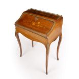 A late 19th century French walnut bureau de dame with marquetry inlay and gilt mounts 67cm wide 44cm