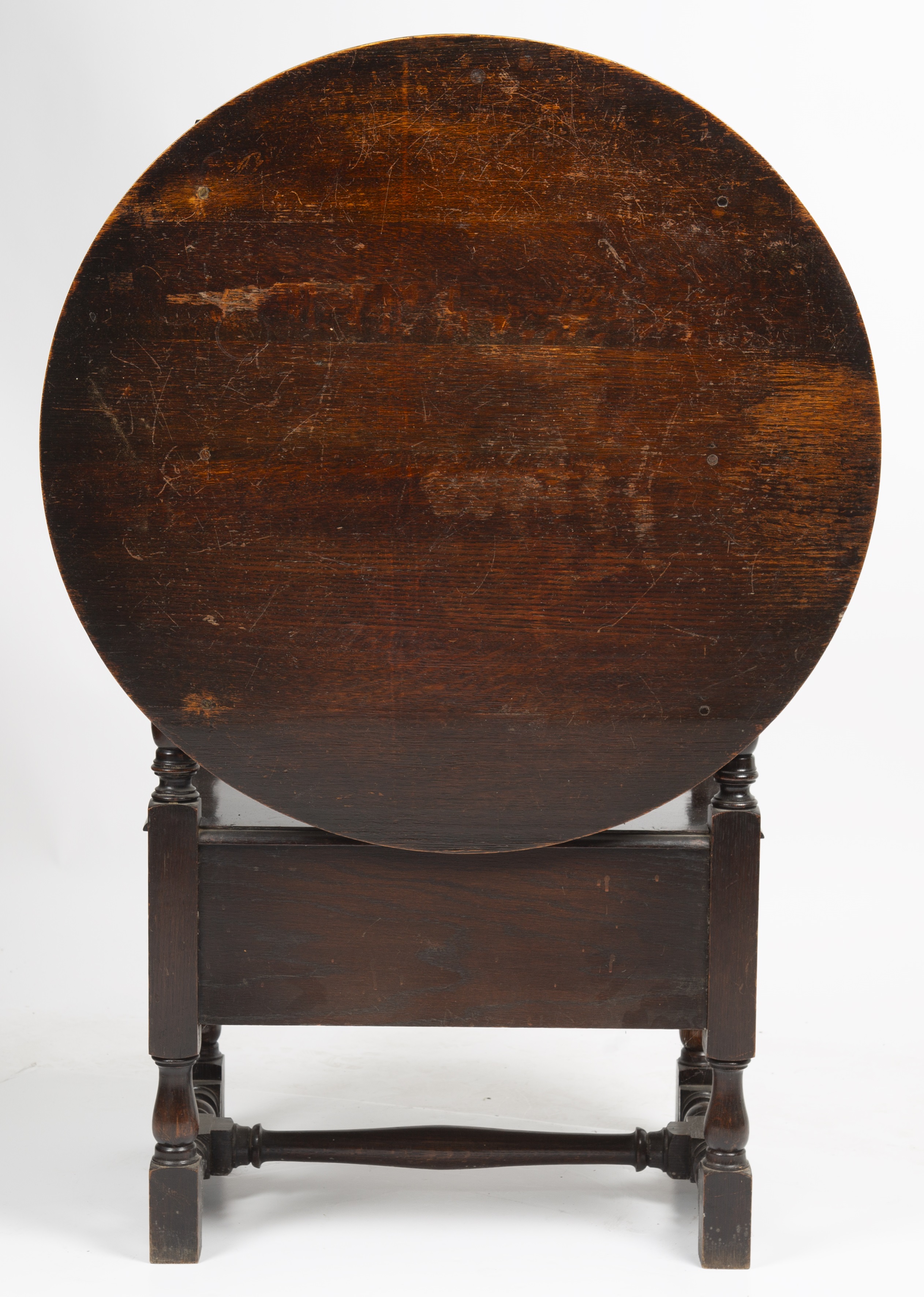 An early 20th century oak monks seat, the lifting back with a carved floral design all raised on - Image 5 of 5