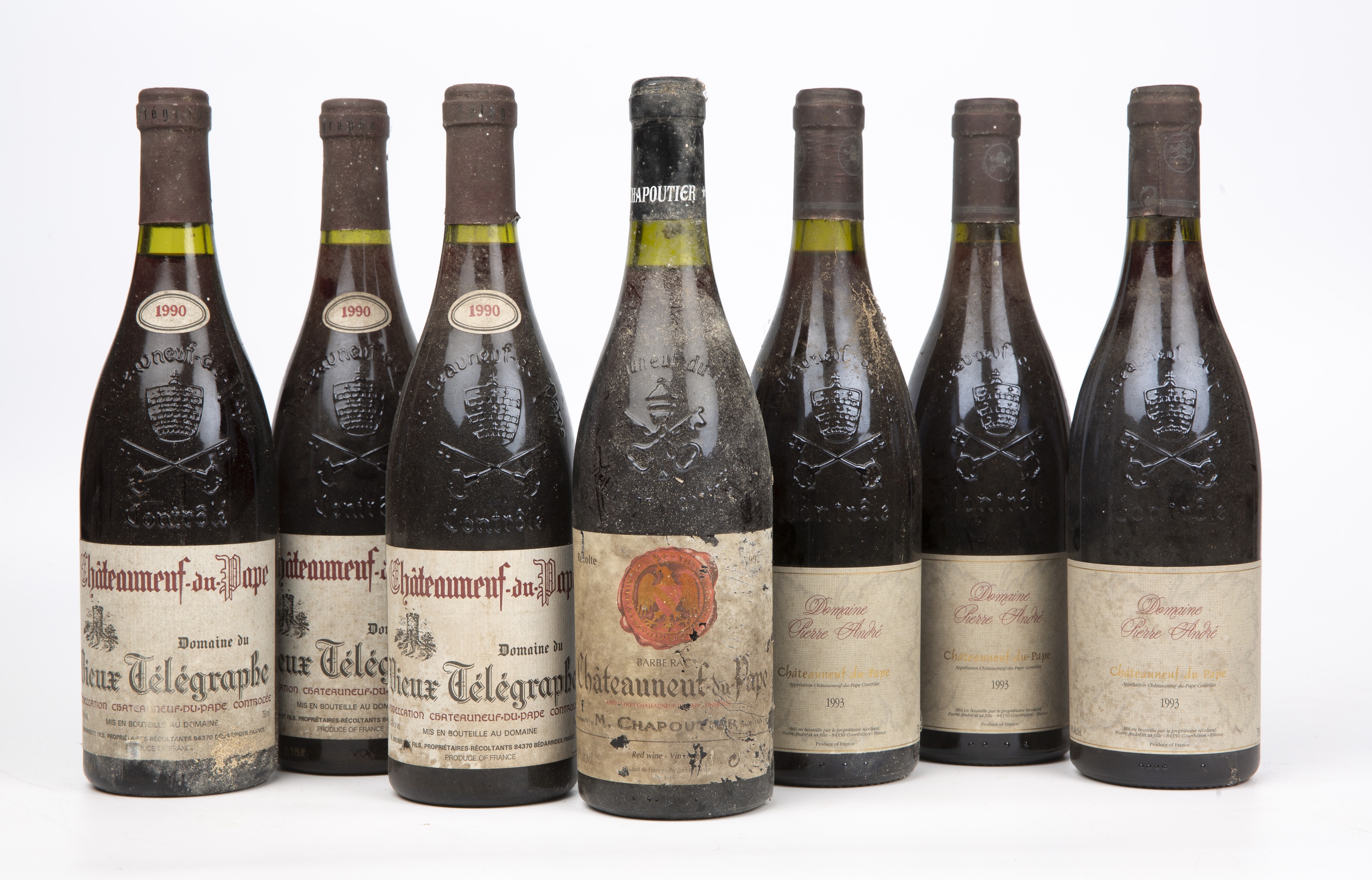A bottle of 1992 M. Chapoutier Chateauneuf-du-Pape Barbe Rac, Rhone, France and three bottles of