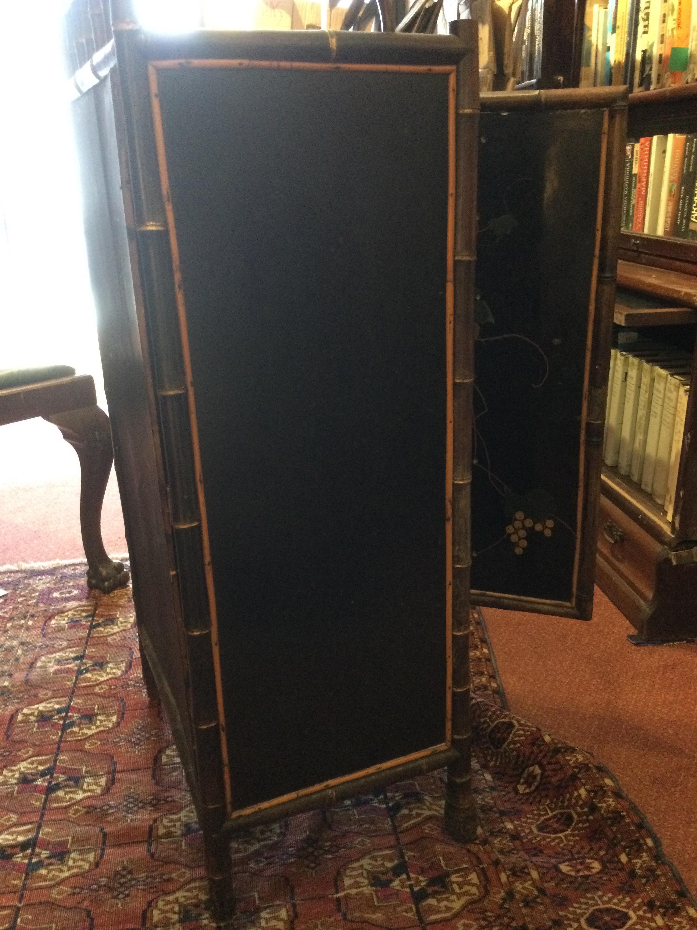 A late 19th century lacquered bamboo cabinet with a single door opening to reveal six drawers 47cm - Image 30 of 47