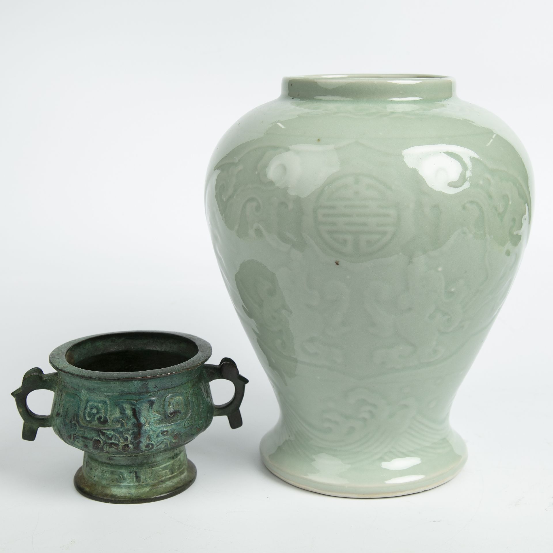 A Chinese porcelain celadon vase 22cm wide 26cm high together with a eastern bronze censer of - Image 2 of 4