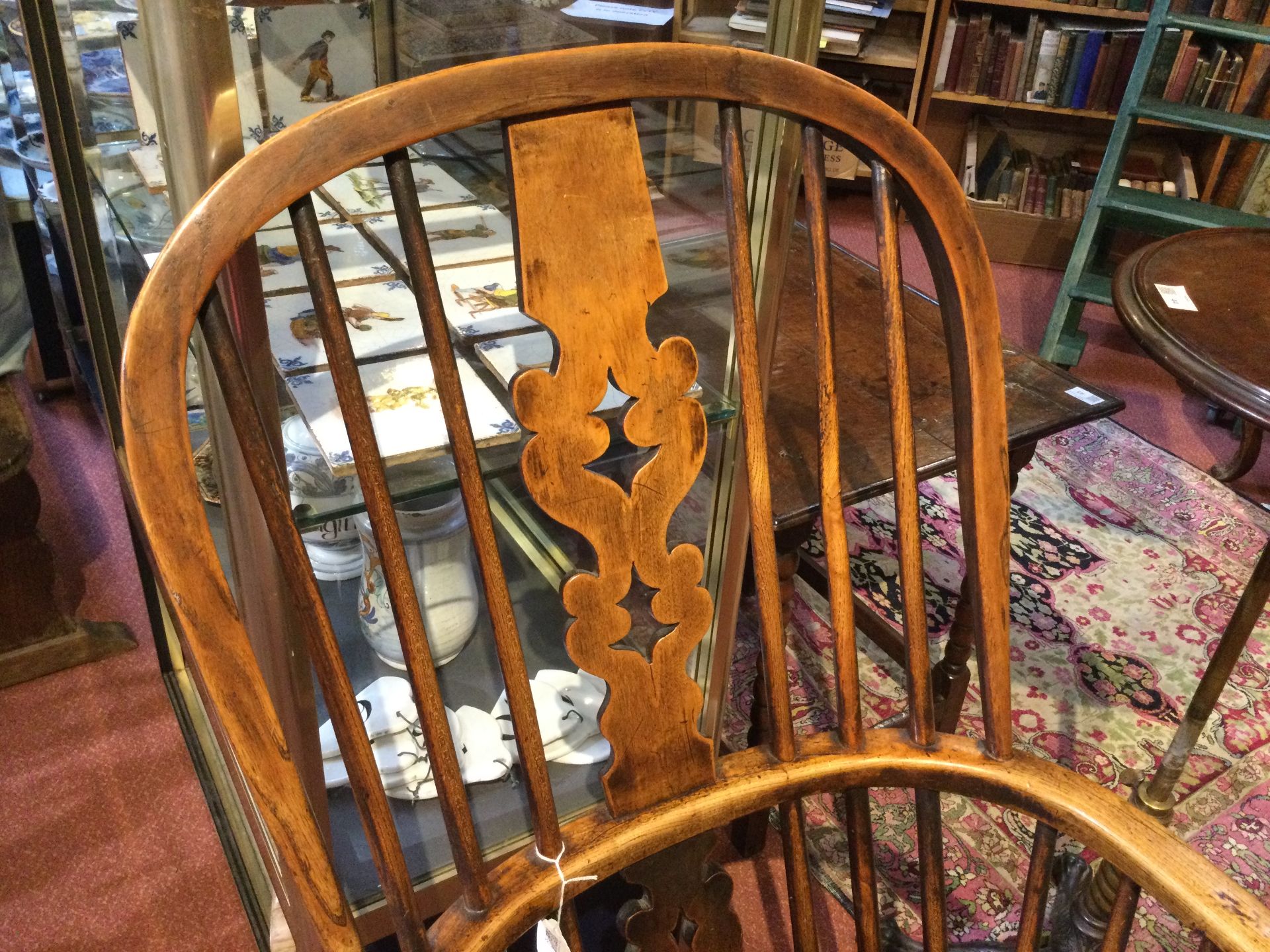 A 19th century ash and elm spindle back Windsor armchair with a pierced splat and turned supports, - Bild 15 aus 15