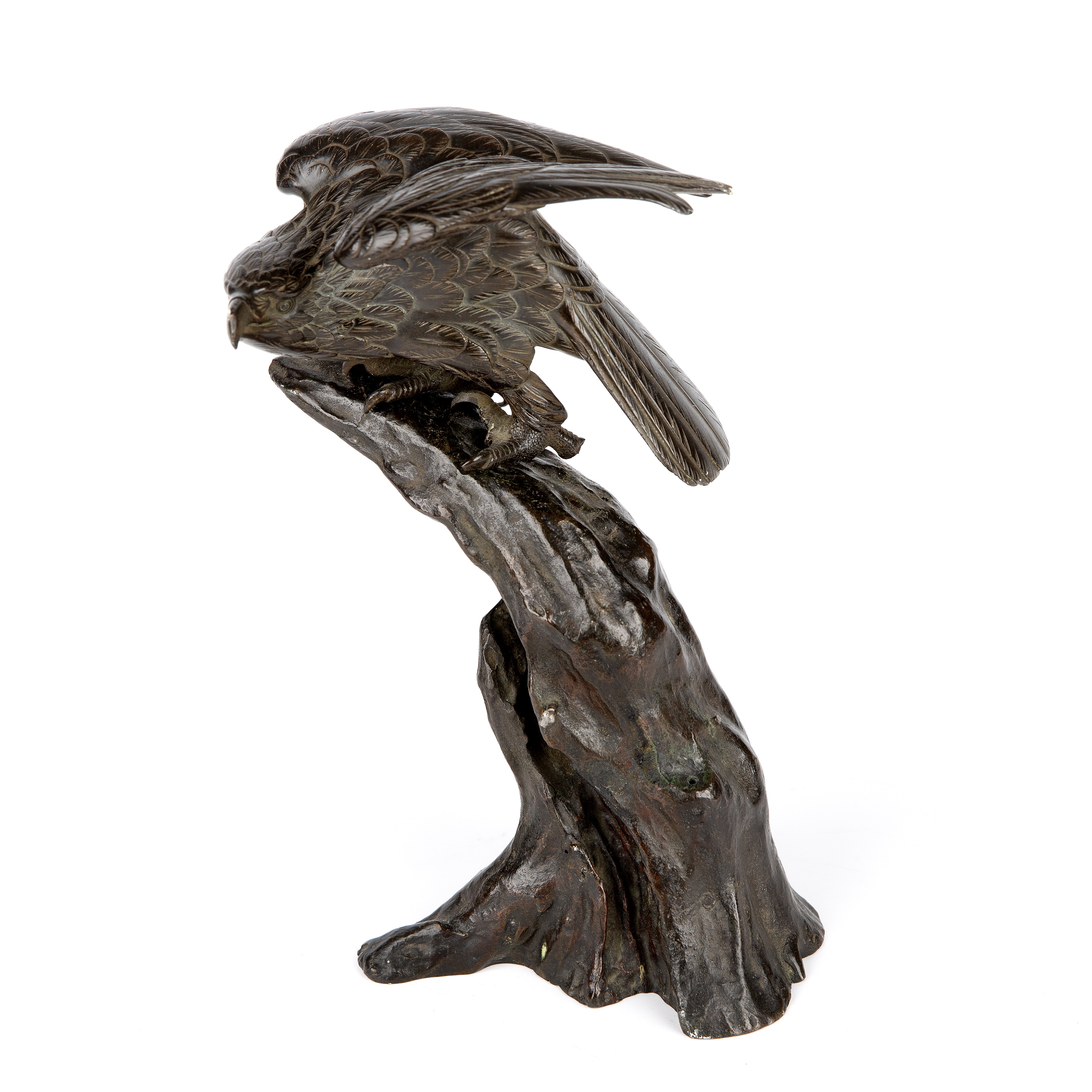 A 19th century Japanese bronze eagle on tree perch 15cm wide 26cm high together with an eastern