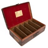A Victorian leather cartridge case with a James Purdey and Sons label, 39cm x 23cm