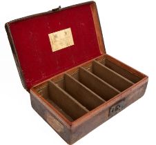 A Victorian leather cartridge case with a James Purdey and Sons label, 39cm x 23cm