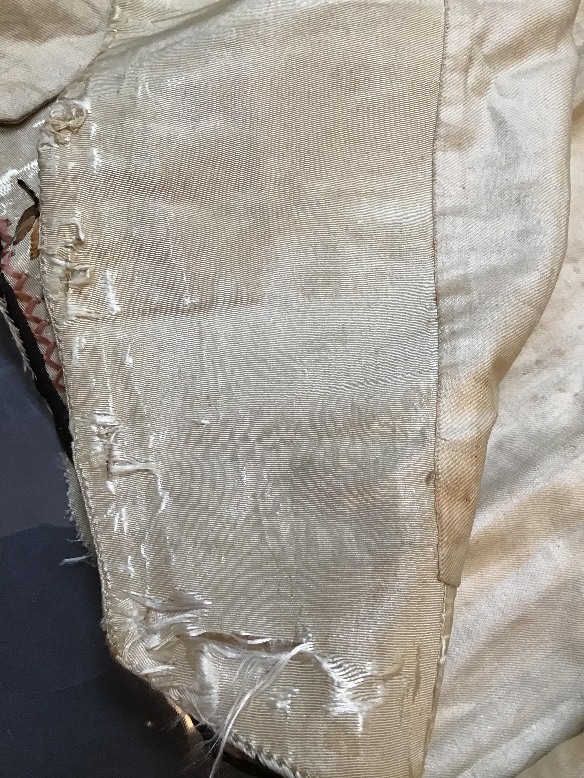 A Georgian silk embroidered waistcoat, decorated with flowers. Stains, marks.  Fraying around button - Image 22 of 24