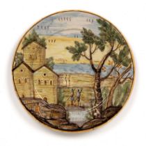 In the manner of Carlo Antonio Grue (1655-1723) Maiolica dish circa 1740, painted with a coastal