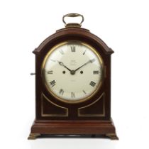 A late Victorian/Edwardian mahogany bracket clock, the white painted convex Roman dial signed