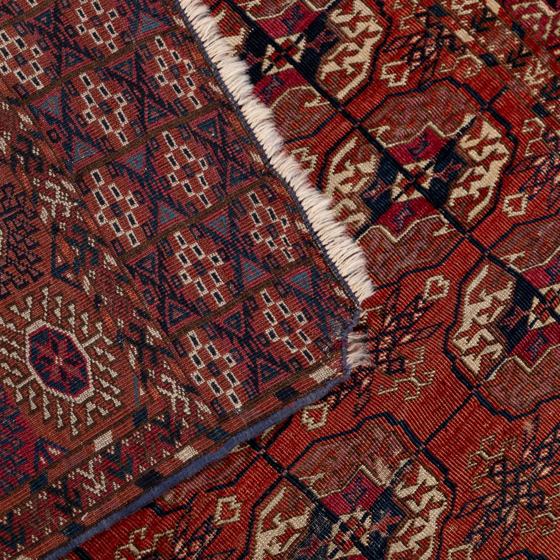 A mid 19th century Tekke Turkoman rug with three rows of guls 107cm x 190cm - Image 2 of 2