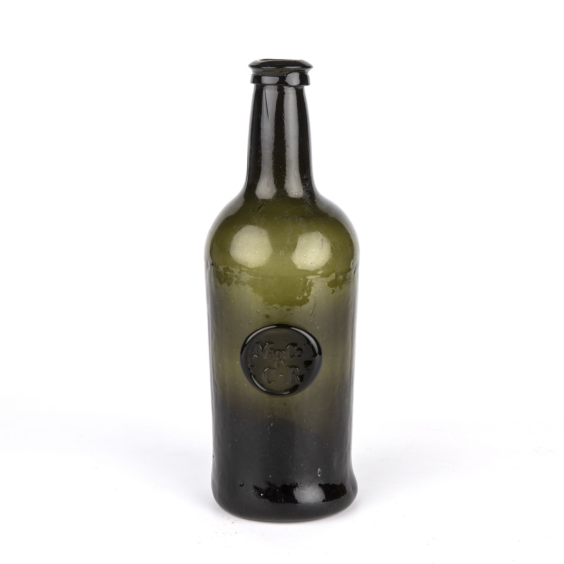 An 18th century Magdalen college green glass bottle, with a seal marked Mag.Col C.R circa 1770-80,