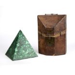 A malachite pyramid 19cm wide 20cm high together with an early 19th century leather bound