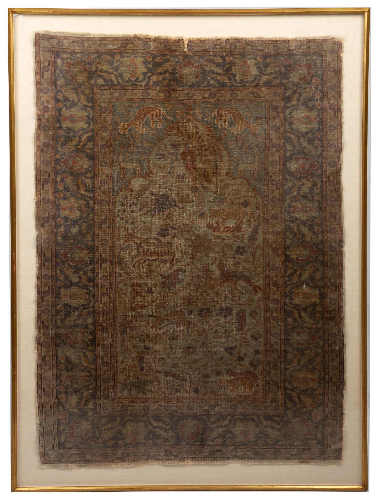 An antique Persian rug decorated with flora and fauna 80cm x 110cm - Image 2 of 2
