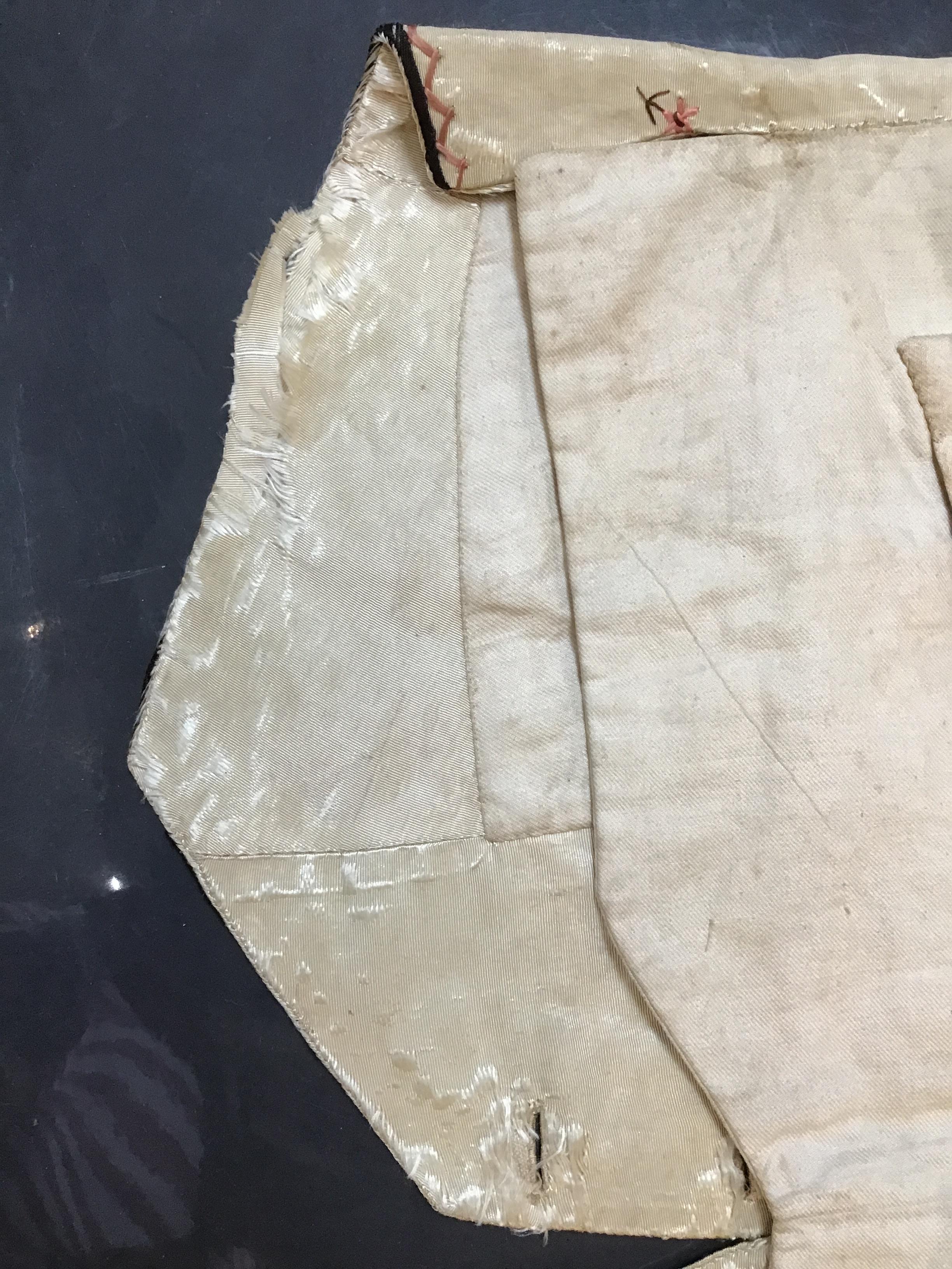 A Georgian silk embroidered waistcoat, decorated with flowers. Stains, marks.  Fraying around button - Image 12 of 24
