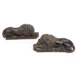 A pair of 19th century of bronze recumbent Lions After Canova 22cm wide 9cm high