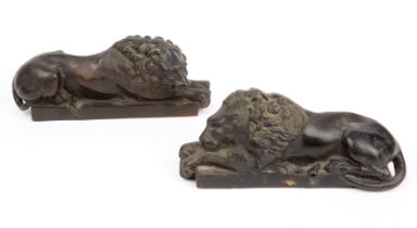 A pair of 19th century of bronze recumbent Lions After Canova 22cm wide 9cm high