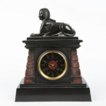 A late 19th century slate mantle clock with a bronze Sphinx, the black dial signed Leroy and Fils,