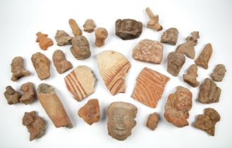 A collection of ancient Indian terracotta figures and fragments to include Ban Chaing Thailand