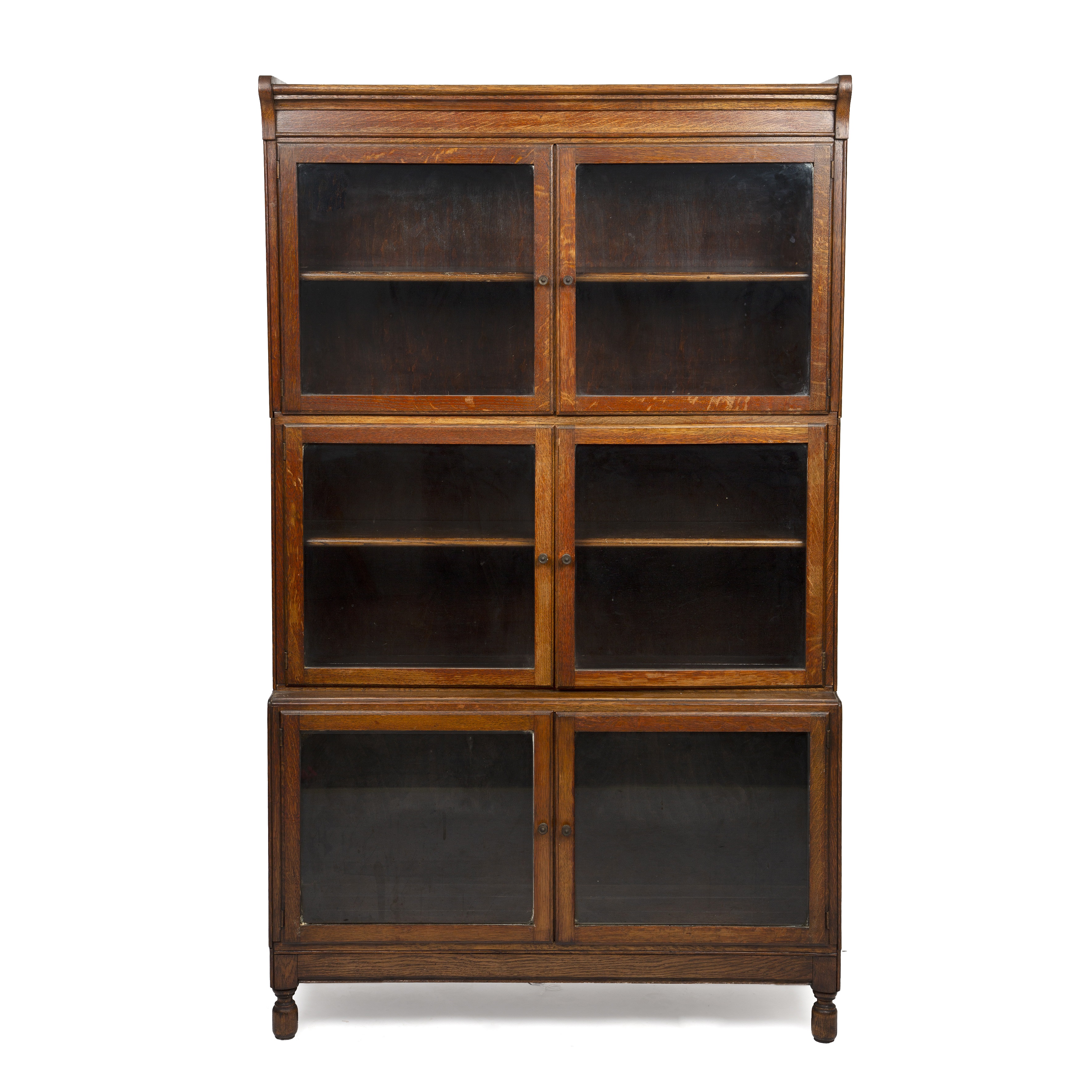 A Minty style three-tier oak bookcase with glazed doors, 90cm wide 150cm high