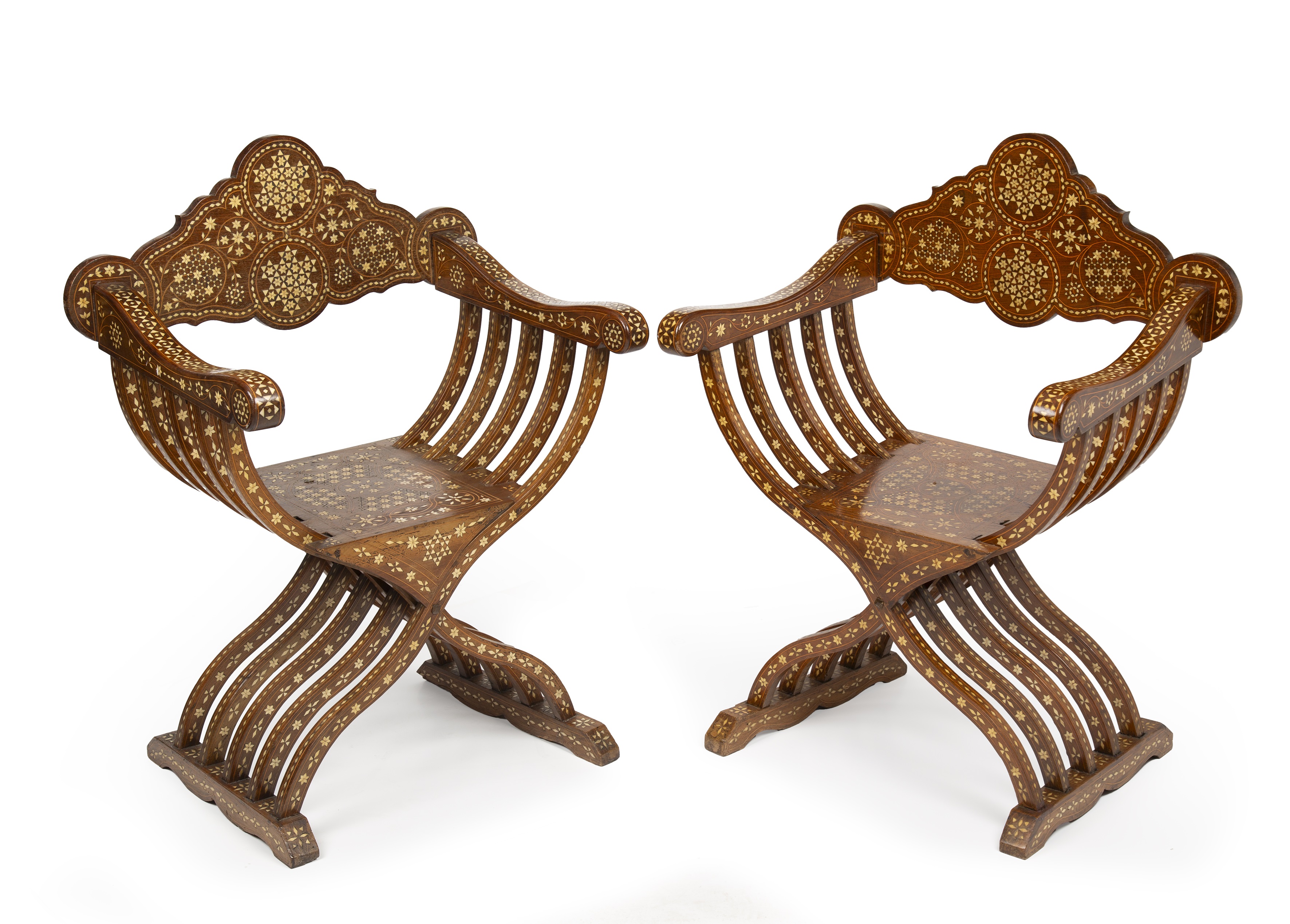 A pair of early 20th century eastern bone inlaid Savonarola chairs 70cm wide 50cm deep 97cm high