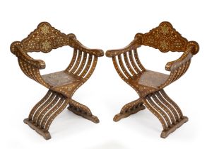 A pair of early 20th century eastern bone inlaid Savonarola chairs 70cm wide 50cm deep 97cm high