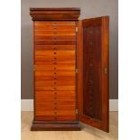A Victorian mahogany collectors cabinet, the frieze with a blind drawer above twenty glazed-topped
