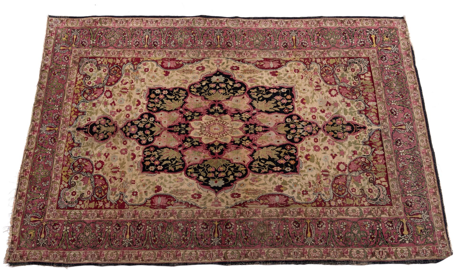 An early 20th century Isfahan rug with geometric foliate decoration, 127cm x 204cm boarder worn,